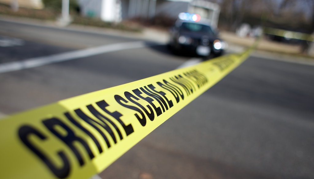 Crime scene tape / Capital Public Radio file photo