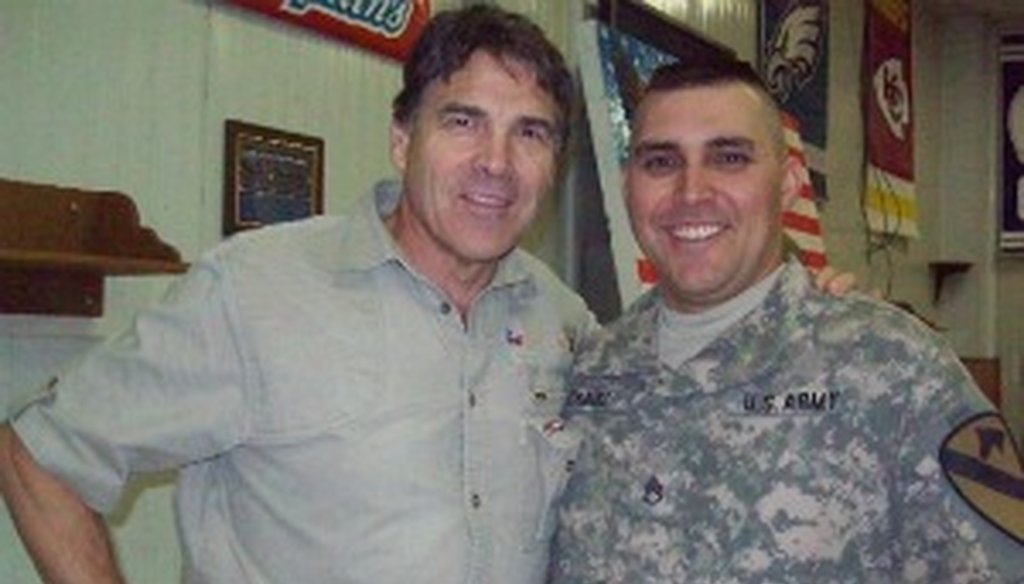 Gov. Rick Perry and Dominic Chavez when Perry visited Texas troops in Iraq in July 2009 (Photo courtesy of Dominic Chavez).