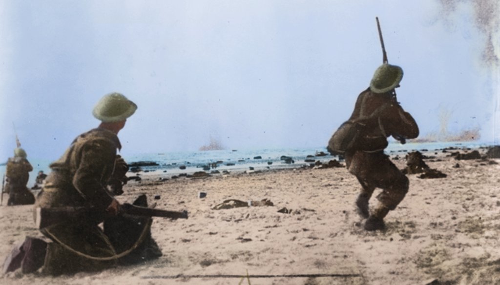British troops fire their rifles at German planes on a bombing run over the beach at Dunkirk. (Cassowary Colorizations, via Flickr Creative Commons)