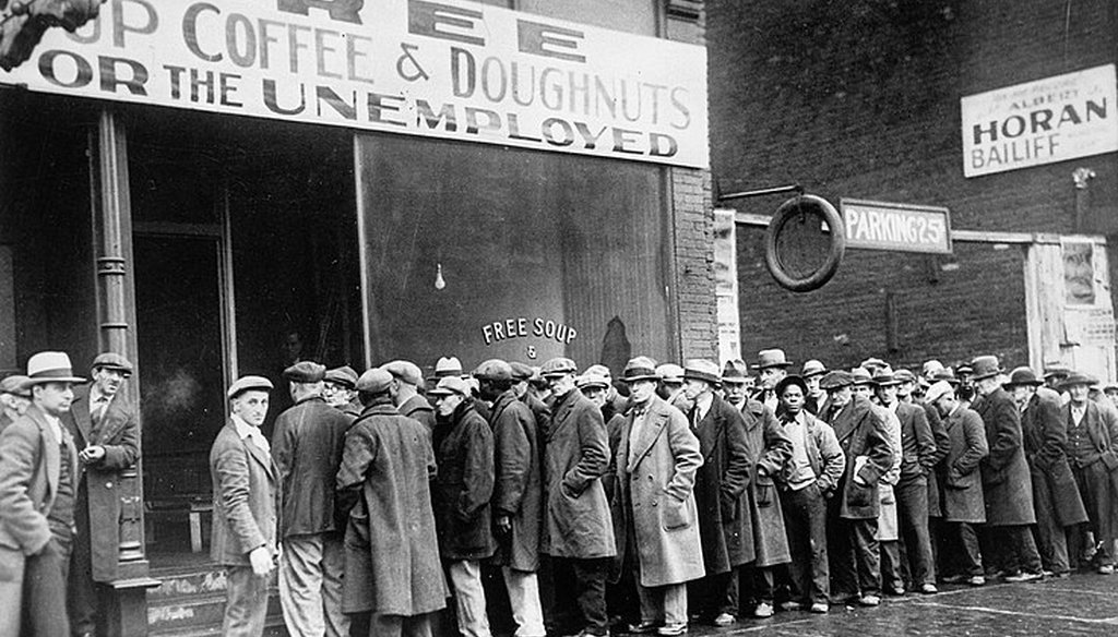 Unemployed men line up outside a depression soup kitchen in Chicago. (National Archives/Public domain)