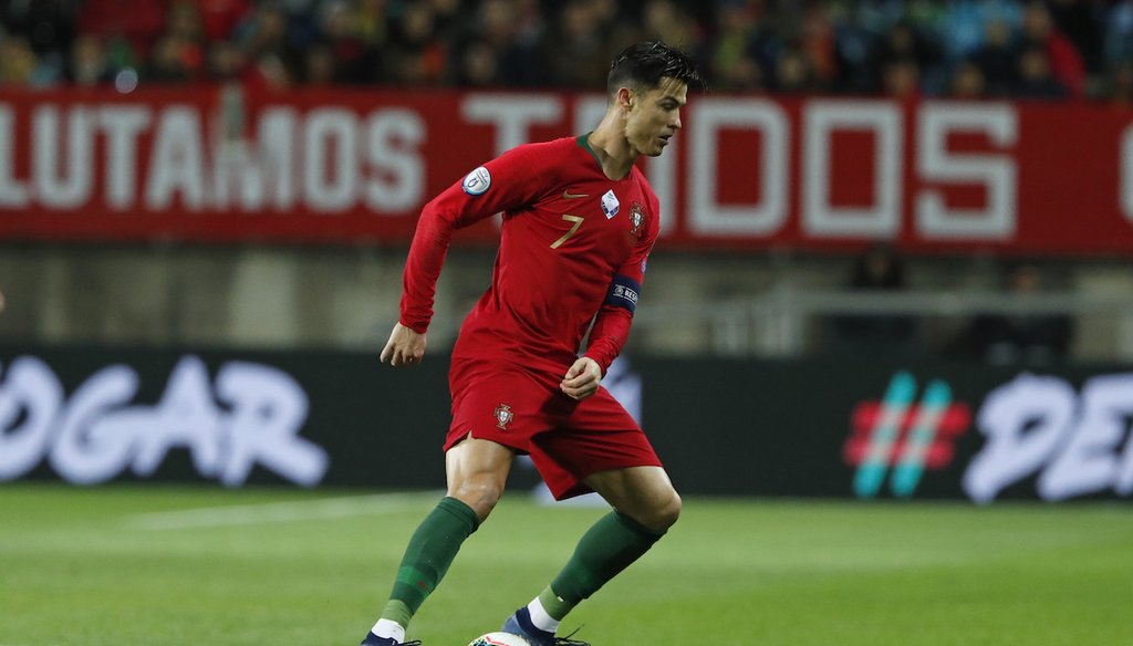 Portugal's Cristiano Ronaldo controls the ball during the Euro 2020 group B qualifying soccer match between Portugal and Lithuania, Nov. 14, 2019. (AP)