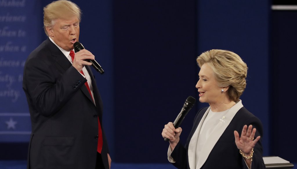 In this Oct. 9, 2016, photo Republican presidential nominee Donald Trump and Democratic presidential nomine Hillary Clinton speak during the second presidential debate at Washington University in St. Louis. (AP)