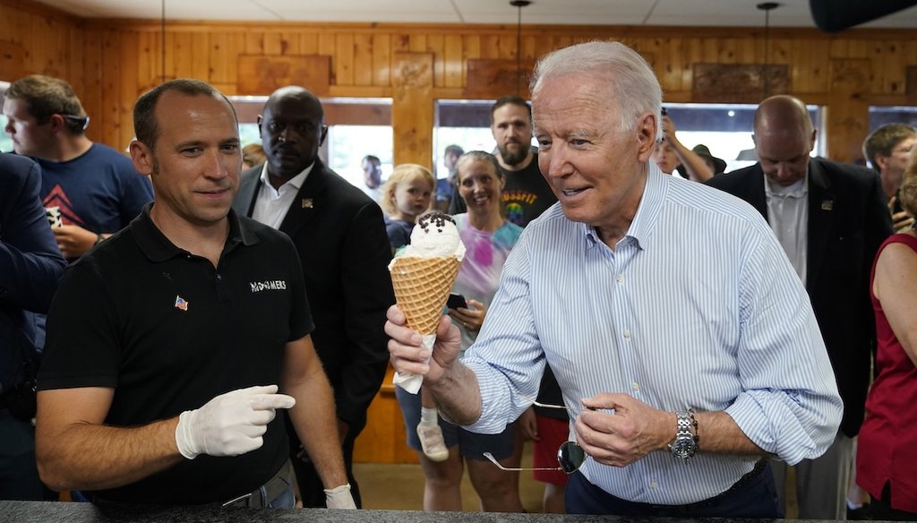 Then-President Joe Biden has an ice cream cone at Moomers Homemade Ice Cream in Traverse City, Mich., on July 3, 2021. (AP)