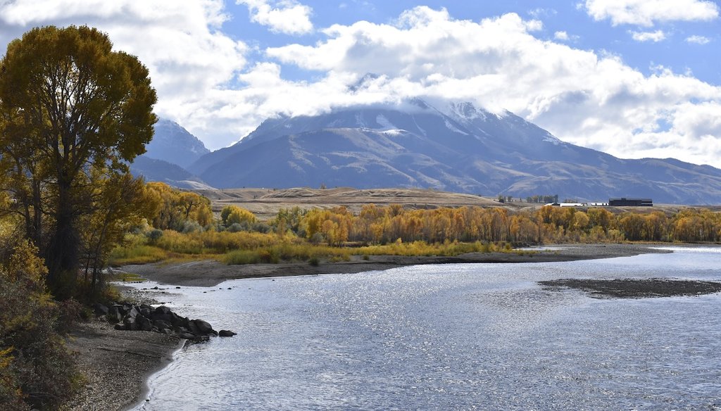 Emigrant Peak rises above the Paradise Valley and the Yellowstone River near Emigrant, Mont. (AP)