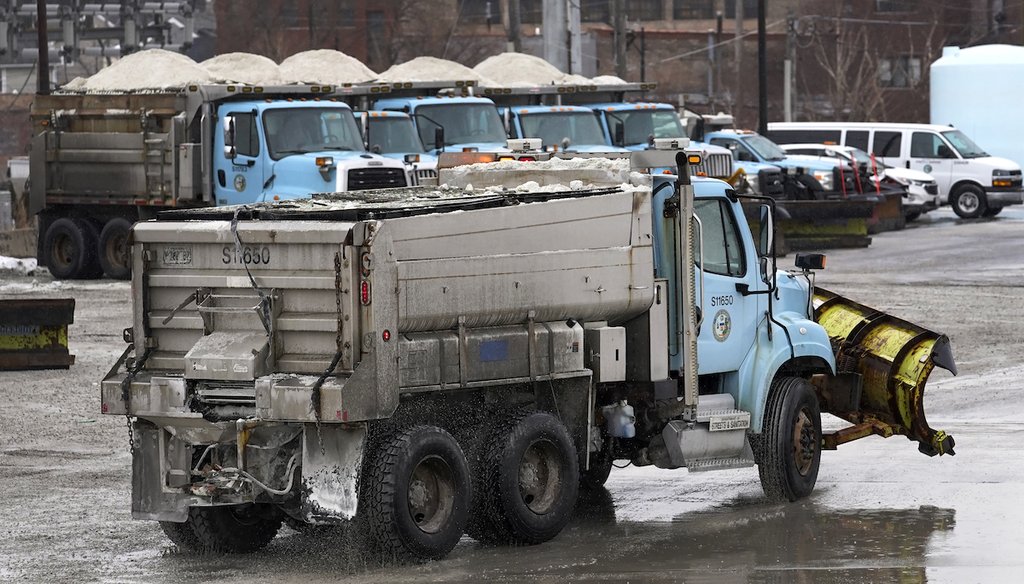 A City of Chicago Department of Streets and Sanitation salt truck heads into a city salt dome for a load as others sit full in anticipation of a winter storm, Feb. 1, 2022, in Chicago. (AP)