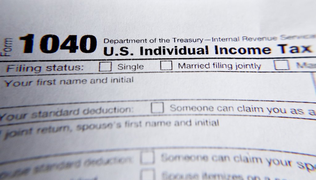 A 1040 federal tax form; file photo from 2019. (AP)