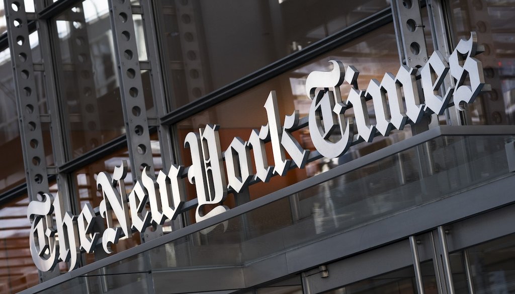 A sign for The New York Times hangs above the entrance to its building, Thursday, May 6, 2021 in New York. (AP)