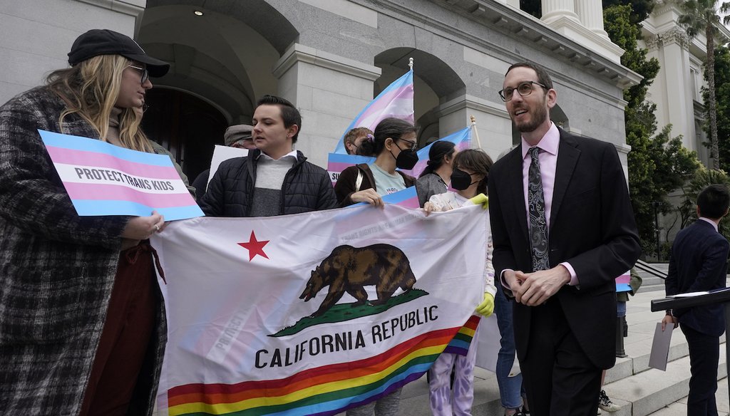 State Sen. Scott Wiener, D-San Francisco, right, prepares to announce his proposed measure to provide legal refuge to displaced transgender youth and their families during a March 17, 2022, a news conference in Sacramento, Calif. (AP)