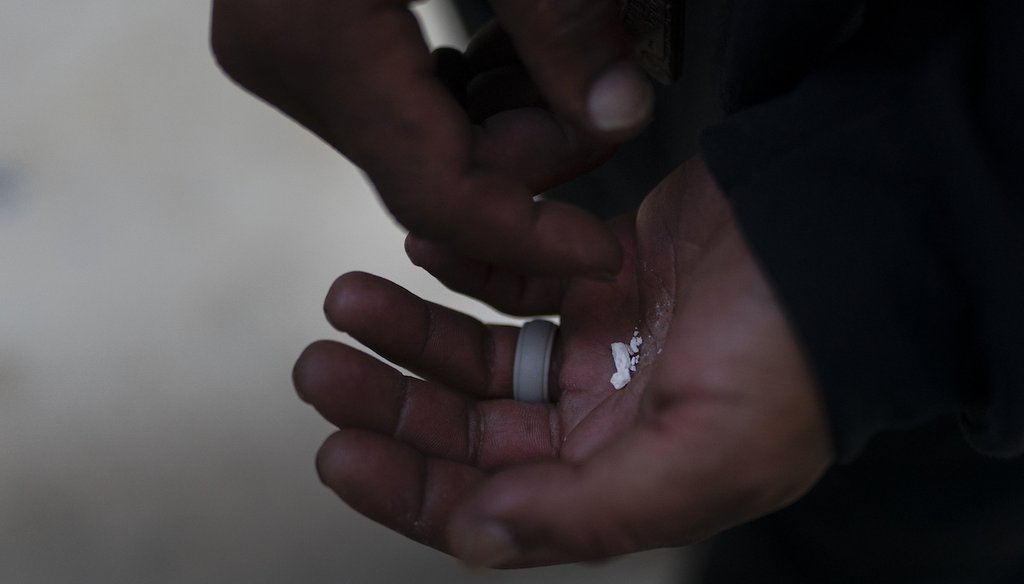 A homeless person holds pieces of fentanyl in Los Angeles, Aug. 18, 2022. Use of the powerful synthetic opioid that is cheap to produce and is often sold as is or laced in other drugs, has exploded. (AP)