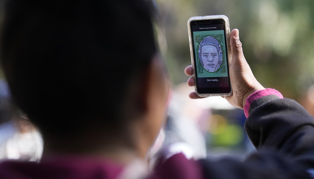 A migrant from Michoacan, Mexico, uses the CBPOne app, Jan. 24, 2023, in Tijuana, Mexico. (AP)