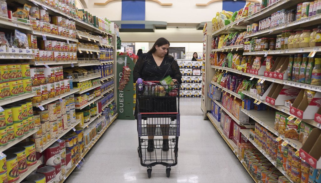 Jaqueline Benitez shops for groceries at a supermarket in Bellflower, Calif., on Feb. 13, 2023. Benitez, 21, works as a preschool teacher and depends on California's SNAP benefits. (AP)