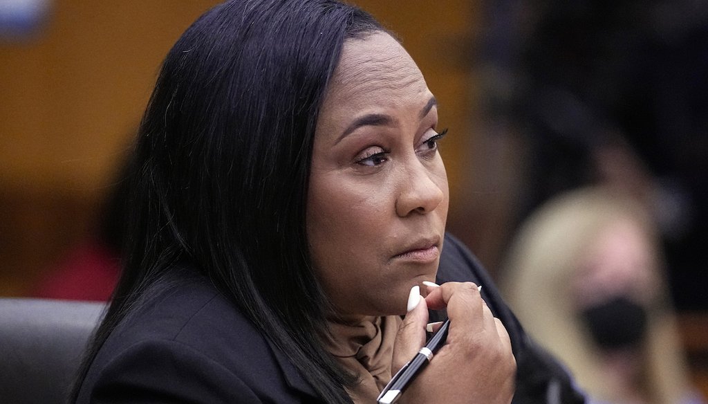 Fulton County District Attorney Fani Willis watches proceedings during a hearing to decide if the final report by a special grand jury looking into possible interference in the 2020 presidential election can be released Jan. 24, 2023, in Atlanta. (AP)