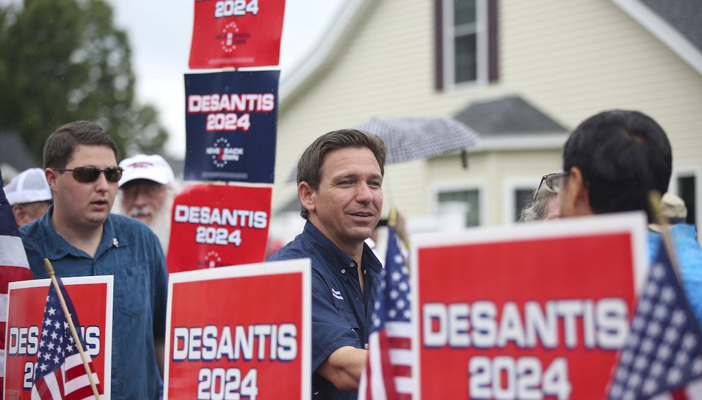 Republican presidential candidate Ron DeSantis walks in the July 4th parade, July 4, 2023, in Merrimack, N.H. (AP)
