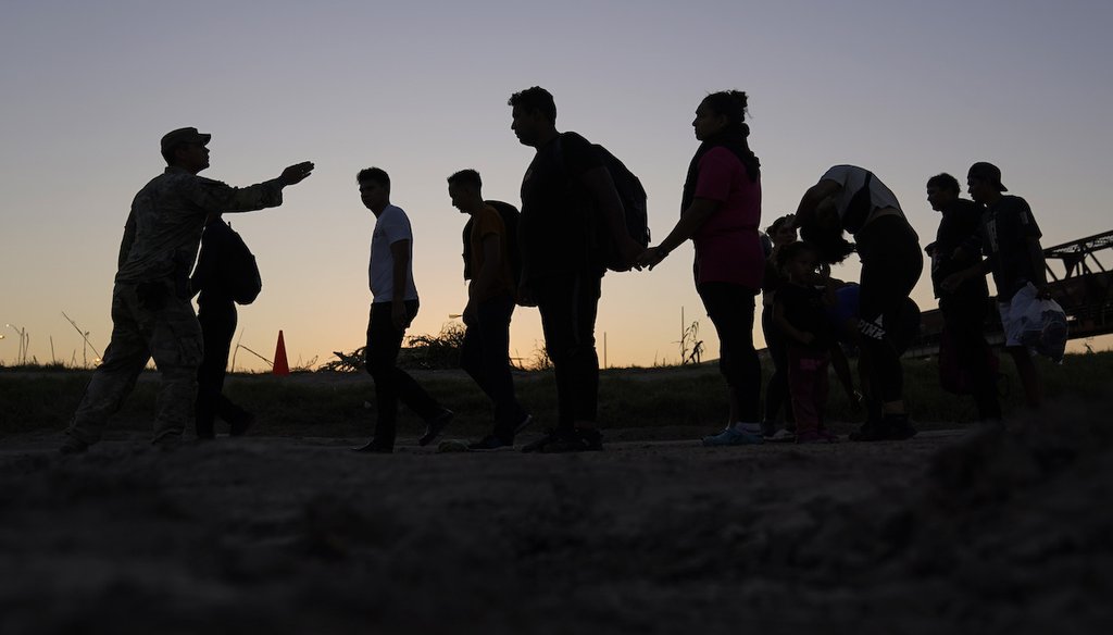 Migrants who crossed the Rio Grande and entered the U.S. from Mexico are lined up for processing by U.S. Customs and Border Protection, Sept. 23, 2023, in Eagle Pass, Texas. (AP)