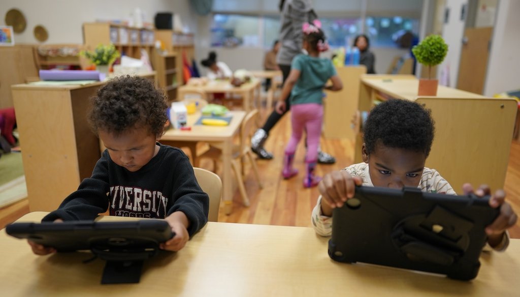 Children work on tablet computers Nov. 21, 2023, during a preschool class at the Life Learning Center Head Start in Cincinnati. (AP)