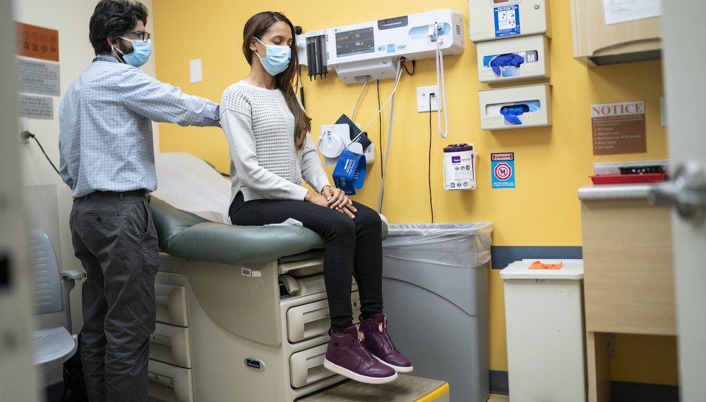 Dr. Matthew Kusher, clinical director of Plaza del Sol Family Health Center in Queens, N.Y., checks a patient in 2024. (AP)