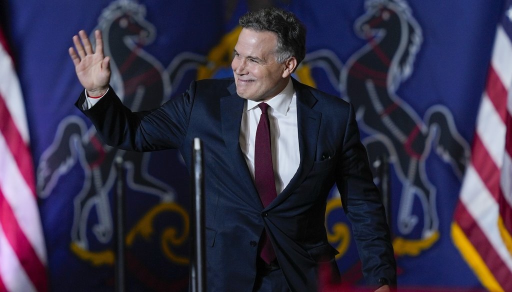 Republican Pennsylvania Senate candidate David McCormick walks onstage July 31, 2024, for during a campaign rally for former President Donald Trump, the 2024 Republican presidential candidate, in Harrisburg, Pa. (AP)