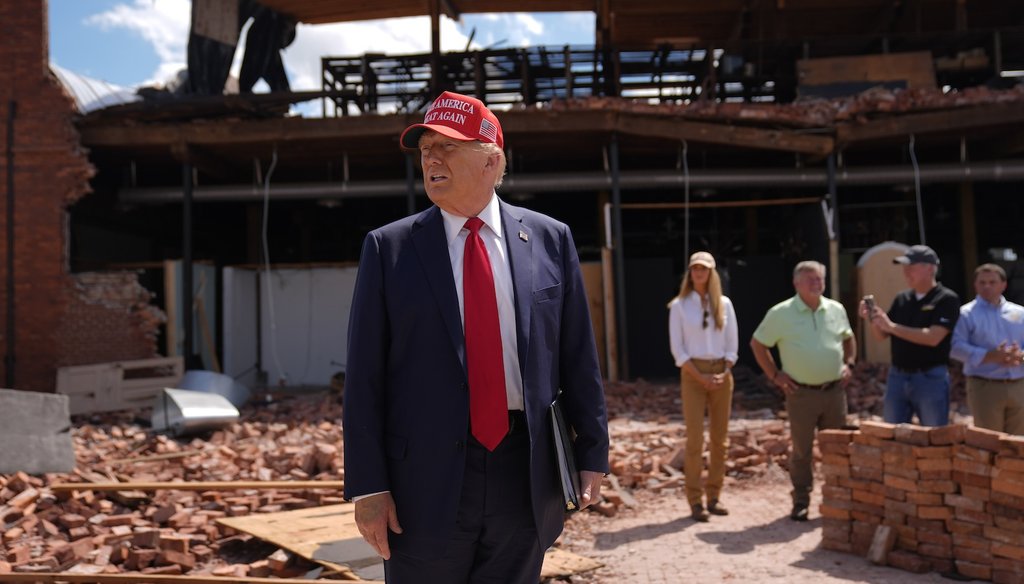 Republican presidential nominee former President Donald Trump speaks outside the Chez What furniture store as he visits Valdosta, Ga., a town impacted by Hurricane Helene, Monday, Sept. 30, 2024. (AP)