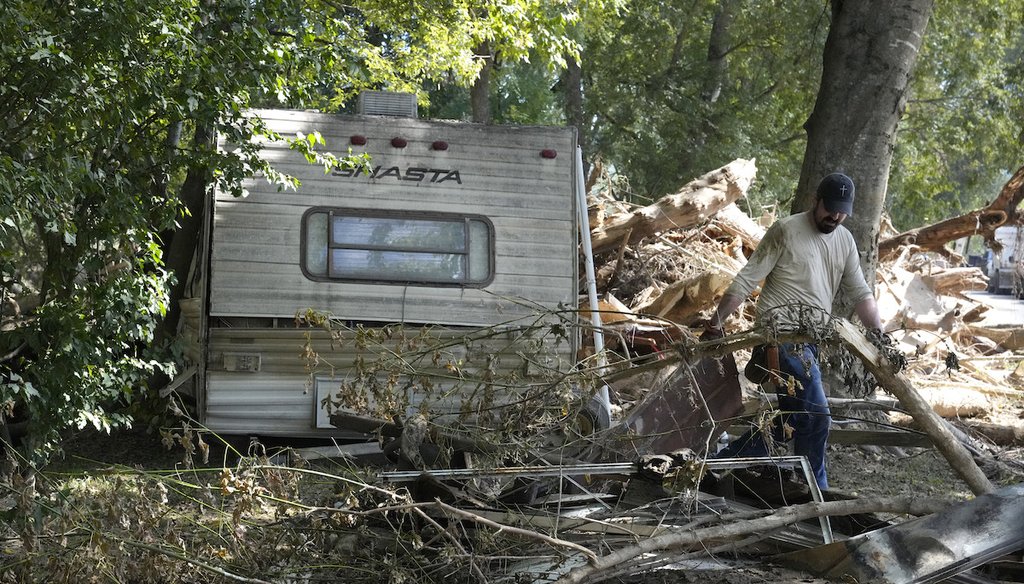 A person clears debris left in the aftermath of Hurricane Helene, Oct. 5, 2024, in Del Rio, Tenn. (AP)