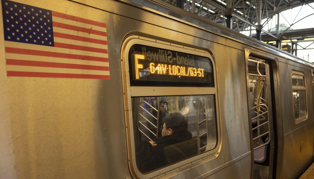 Commuters sit on the F train at the Coney Island-Stillwell Avenue Station, Dec. 26, 2024, in New York. (AP)