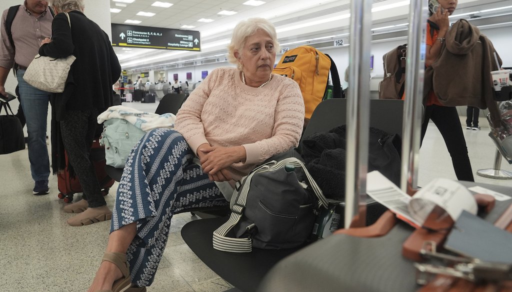 Mayra Cardenas waits before checking her bags on a flight back to Caracas, Venezuela, June 5, 2025, at Miami International Airport. Cardenas was visiting her daughter on a tourist visit. She fears she may not be able to see her family for many years. (AP)