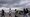 People deported from the U.S. disembark from a repatriation flight, during a Department of Homeland Security operations tour for visiting Homeland Security Secretary Kristi Noem, at La Aurora International Airport in Guatemala City, June 26, 2025. (AP)