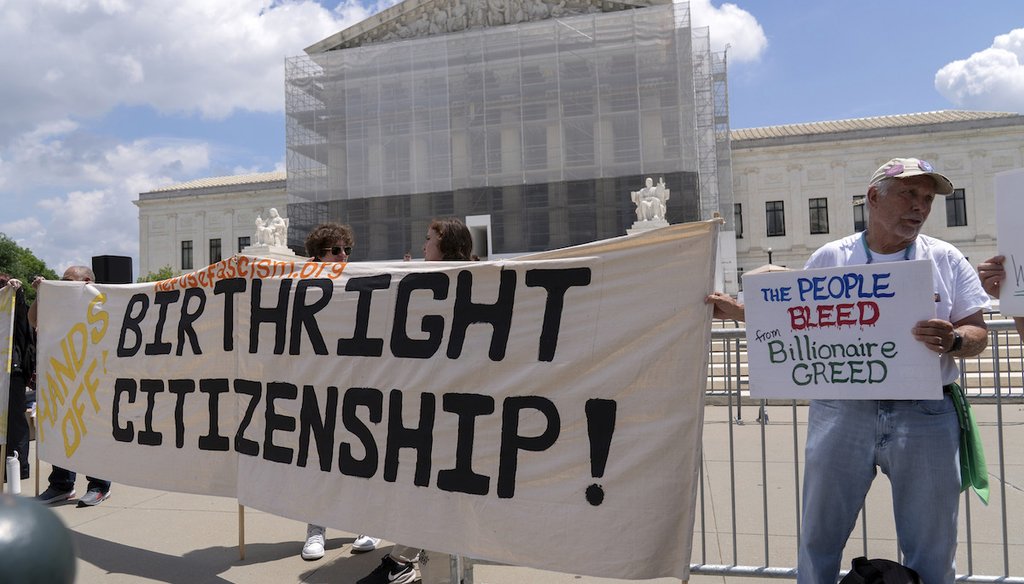 Demonstrators holds up a banner during a citizenship rally outside of the Supreme Court in Washington, May 15, 2025. (AP)