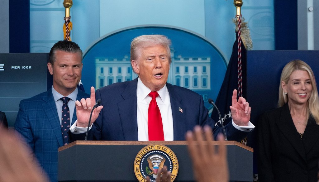 President Donald Trump speaks with reporters in the James Brady Press Briefing Room at the White House, Aug. 11, 2025, in Washington, as Secretary of Defense Pete Hegseth and Attorney General Pam Bondi look on. (AP)
