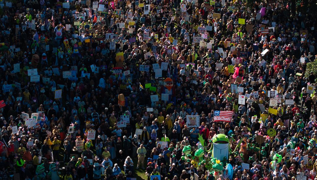 People gather along a waterfront park during a "No Kings" protest in Portland, Ore., on Oct. 18, 2025. (AP)