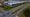 Cars drive past data centers that house computer servers and hardware required to support modern internet use, such as artificial intelligence, in Ashburn, Virginia, July 16, 2023. (AP)