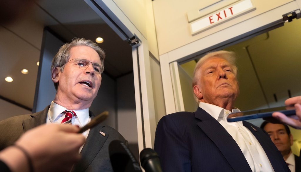 Treasury Secretary Scott Bessent, left, and President Donald Trump, right, talk to reporters on Air Force One while traveling from Kuala Lumpur, Malaysia, to Tokyo, Japan on Oct. 27, 2025. (AP)