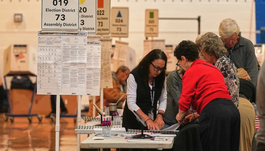 Workers prepare for voters at a poll site, in New York, Nov. 4, 2025. (AP)
