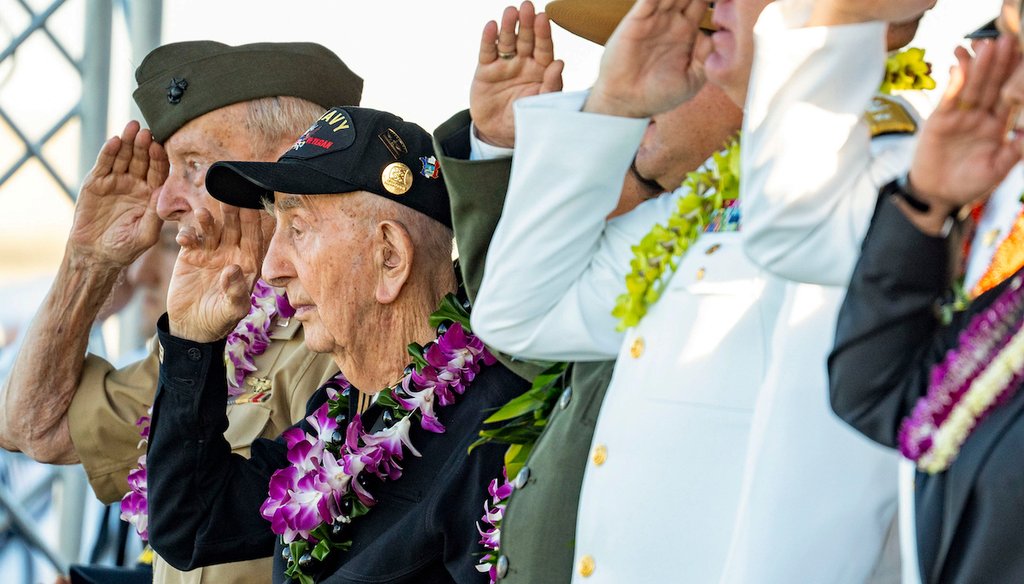 World War II veterans and government officials salute during the 84th Pearl Harbor Remembrance Day Ceremony, Dec. 7, 2025, in Honolulu. (AP)
