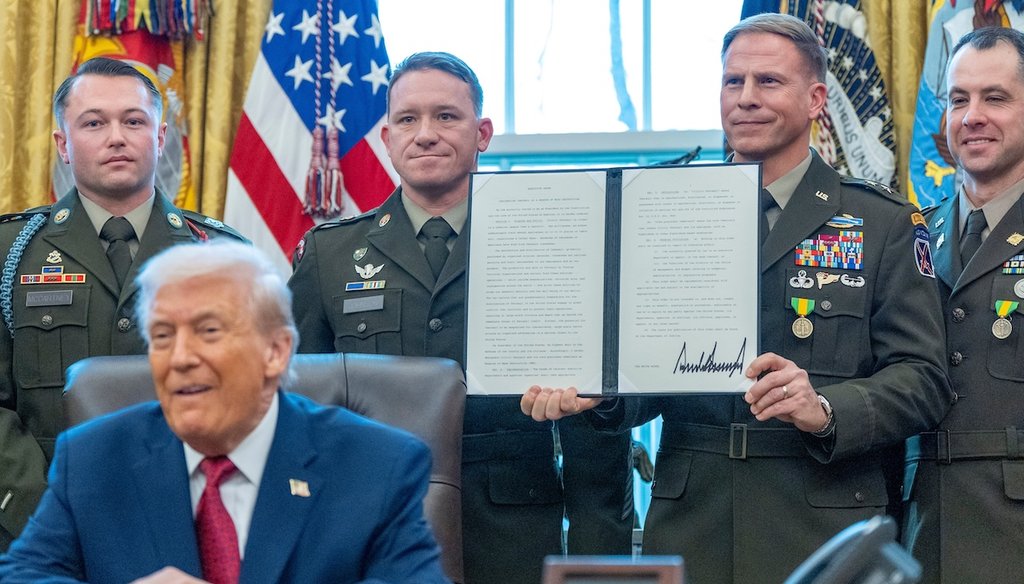 Soldiers hold an executive order about fentanyl signed by President Donald Trump in the Oval Office on Dec. 15, 2025. (AP)