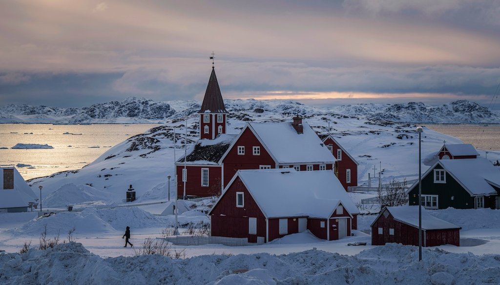 A woman walks near a church in Nuuk, Greenland, on March 7, 2025. (AP)