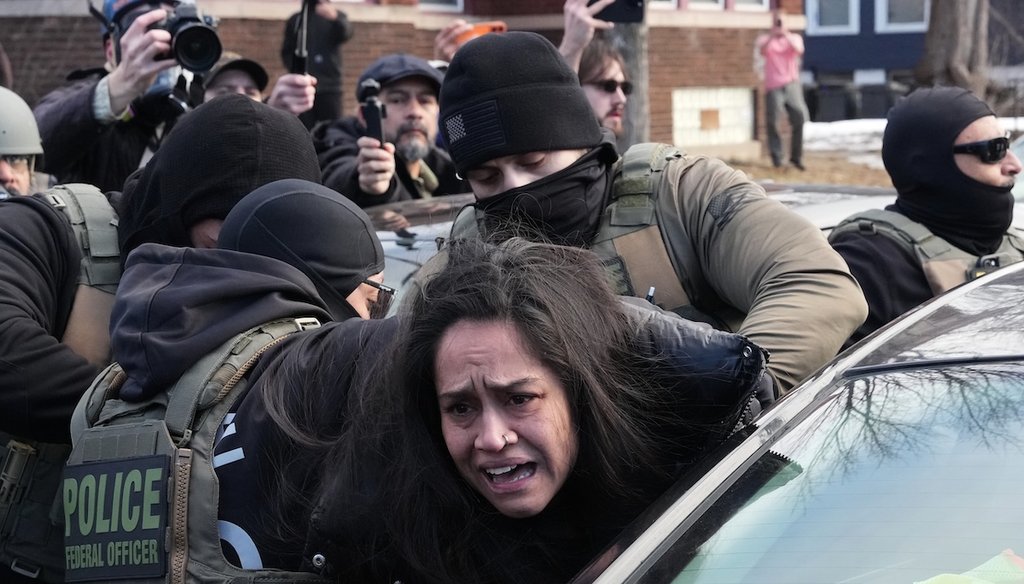 Aliya Rahman is detained by federal agents on Jan. 13, 2026, near the scene where Renee Good was fatally shot by an ICE officer in Minneapolis. (AP)