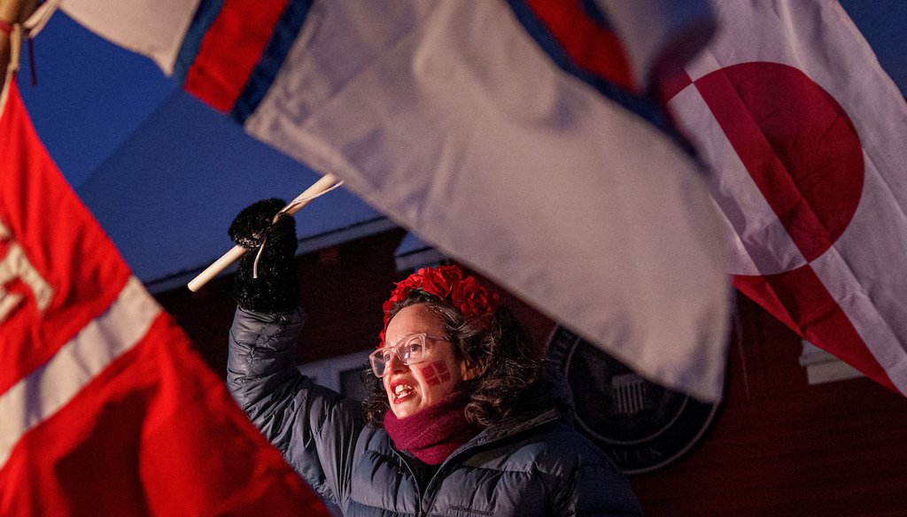 Aviaq Brandt protests against Trump's policy towards Greenland in front of the US consulate in Nuuk, Greenland, on Tuesday, Jan. 20, 2026 (AP)