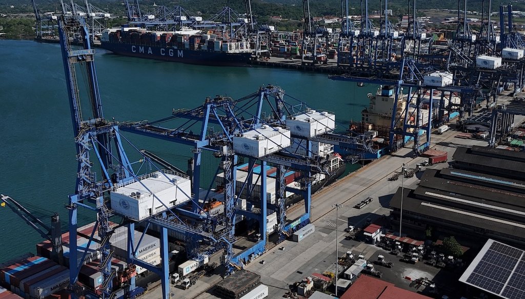 Cranes load a cargo ship at the Panama Canal's Port of Balboa on Jan. 30, 2026. (AP)