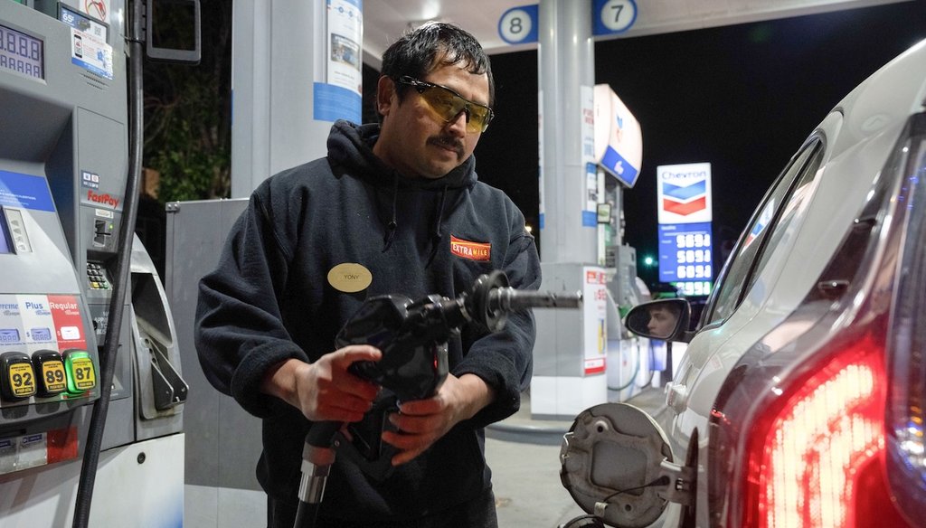 An attendant prepares to fill a customer's tank at a gas station in Portland, Ore., on May 6, 2026. (AP)