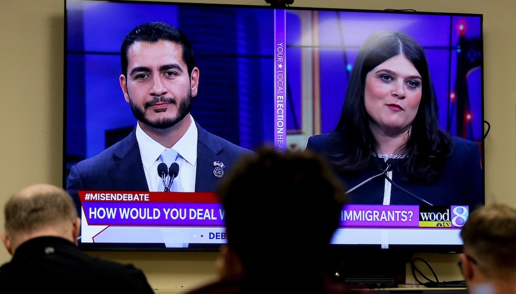 Michigan U.S. Senate candidates, Abdul El-Sayed, left, and Rep. Haley Stevens, D-Mich., are displayed on a television during a debate inside the spin room at WoodTV studios July 7, 2026, in Grand Rapids, Mich. (AP)