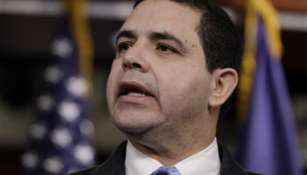 Rep. Henry Cuellar, D-Texas, speaks during a news conference on Capitol Hill in Washington, Tuesday, Jan. 4, 2011. (AP Photo/Charles Dharapak)
