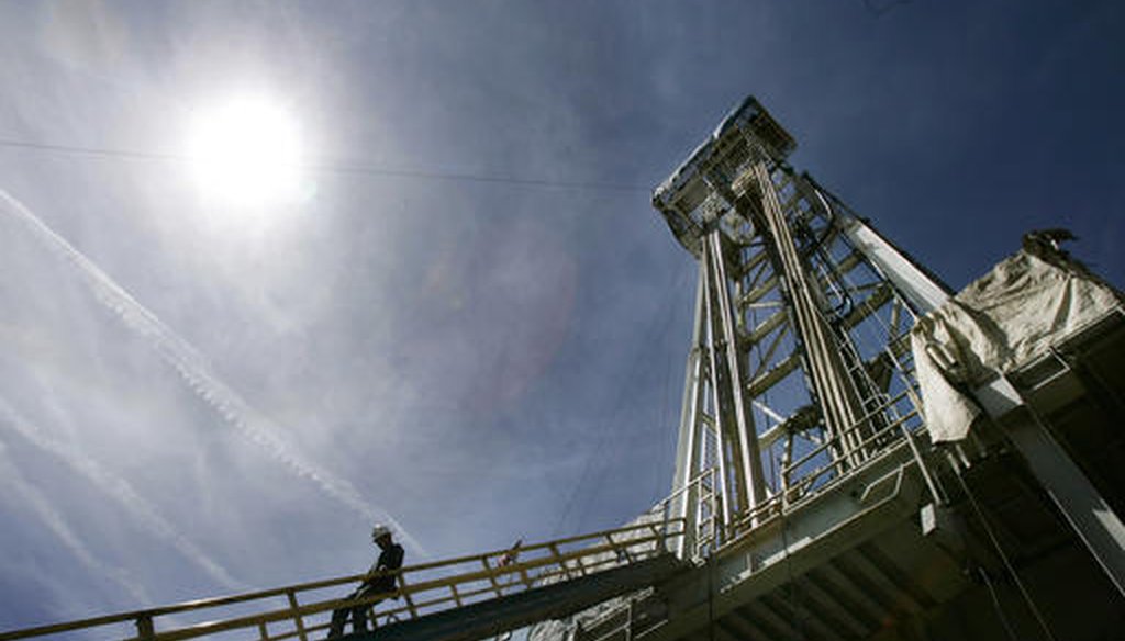 A worker steps down from a geothermal drilling platform at Newberry Crater near LaPine, Ore. (AP/Don Ryan)