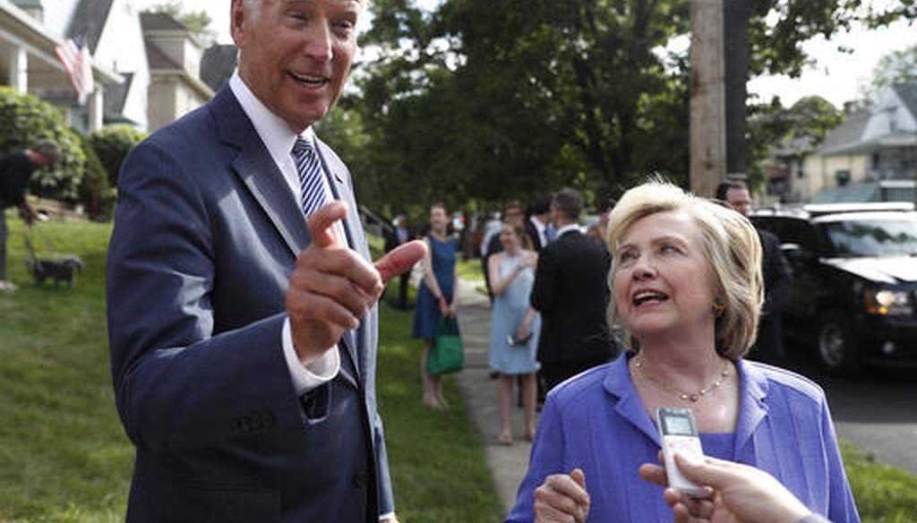 Joe Biden, with Hillary Clinton, talks to the media outside of Biden's childhood home in Scranton, Pa., on Aug. 15, 2016. (AP)