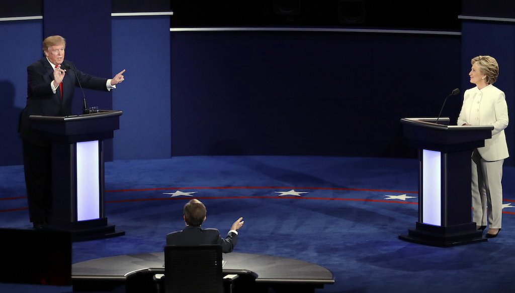Democratic presidential nominee Hillary Clinton and Republican presidential nominee Donald Trump debate during the third presidential debate at UNLV in Las Vegas, Oct. 19, 2016. (AP)