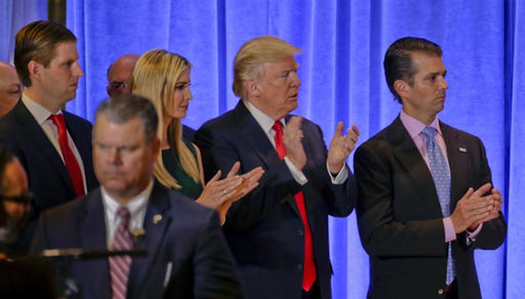 President-elect Donald Trump waits with family members Eric Trump, left, Ivanka Trump and Donald Trump Jr. before speaking at a news conference, Jan. 11, 2017, in New York. (AP/Seth Wenig)