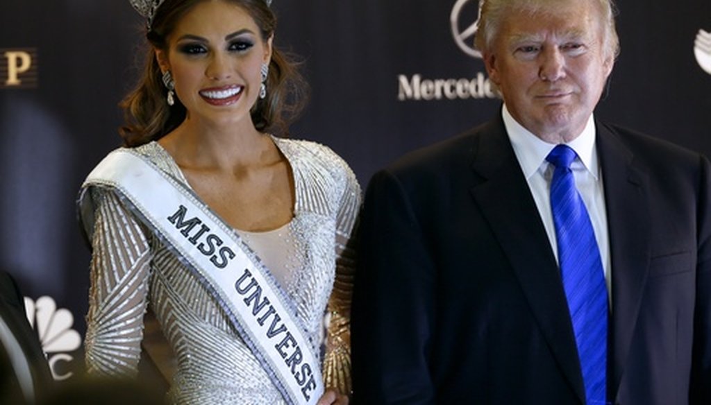 Miss Universe 2013 Gabriela Isler of Venezuela and Donald Trump pose for a photo after the 2013 Miss Universe pageant in Moscow on Nov. 10, 2013. (AP/Ivan Sekretarev)