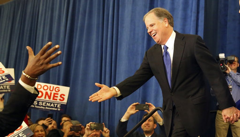 Democratic candidate for U.S. Senate Doug Jones greets supporters before speaking during an election-night watch party Tuesday, Dec. 12, 2017, in Birmingham , Ala. Jones defeated Republican Roy Moore. (AP Photo/John Bazemore)