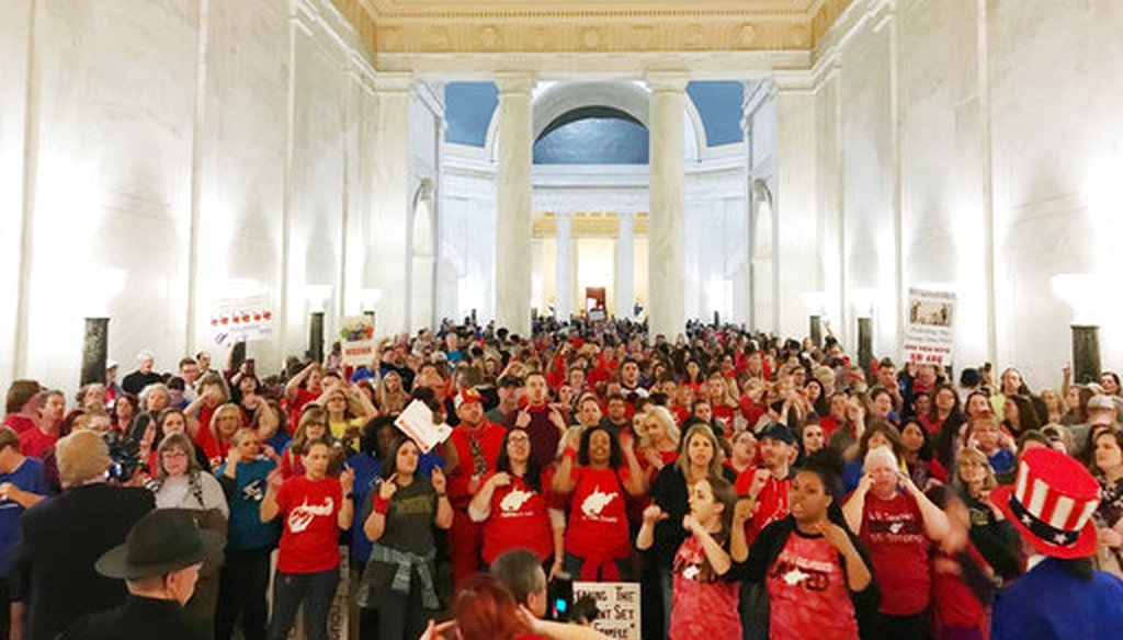 Teachers celebrate after West Virginia Gov. Jim Justice and Senate Republicans announced they reached a tentative deal to end a statewide teachers' strike by giving them 5 percent raises on March 6, 2018. (AP)