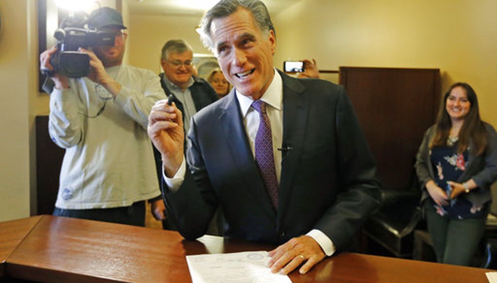 Former Republican presidential nominee Mitt Romney smiles as he declares his candidacy for the U.S. Senate at the state elections office Thursday, March 15, 2018, at the Utah State Capitol, in Salt Lake City. (AP Photo/Rick Bowmer)