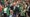 Vice President Mike Pence, center, his wife Karen Pence, left, and his mother Nancy Pence Fritch, right, march in the St. Patrick's Day parade Saturday, March 17, 2018, in Savannah, Ga. (AP Photo/Stephen B. Morton)